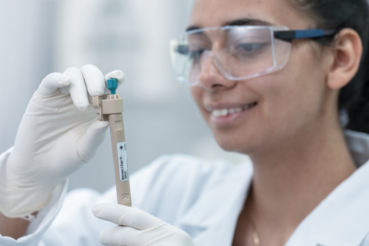 Woman in a lab looking at an IC column
